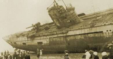Tourists looking at the submarine.