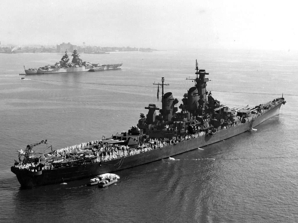 USS New Jersey anchored next to the French battleship Richelieu, 7 September 1943. 