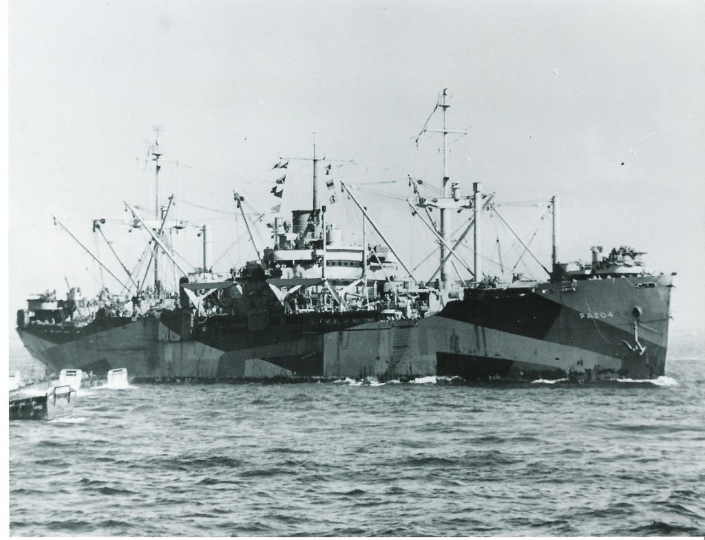 Victory ship USS Sarasota pictured at Lingayen Gulf. 