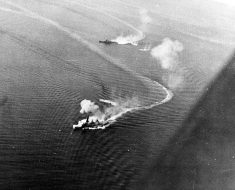 The Japanese battleship Fusō under attack from US aircraft during the Battle Of Surigao Strait.