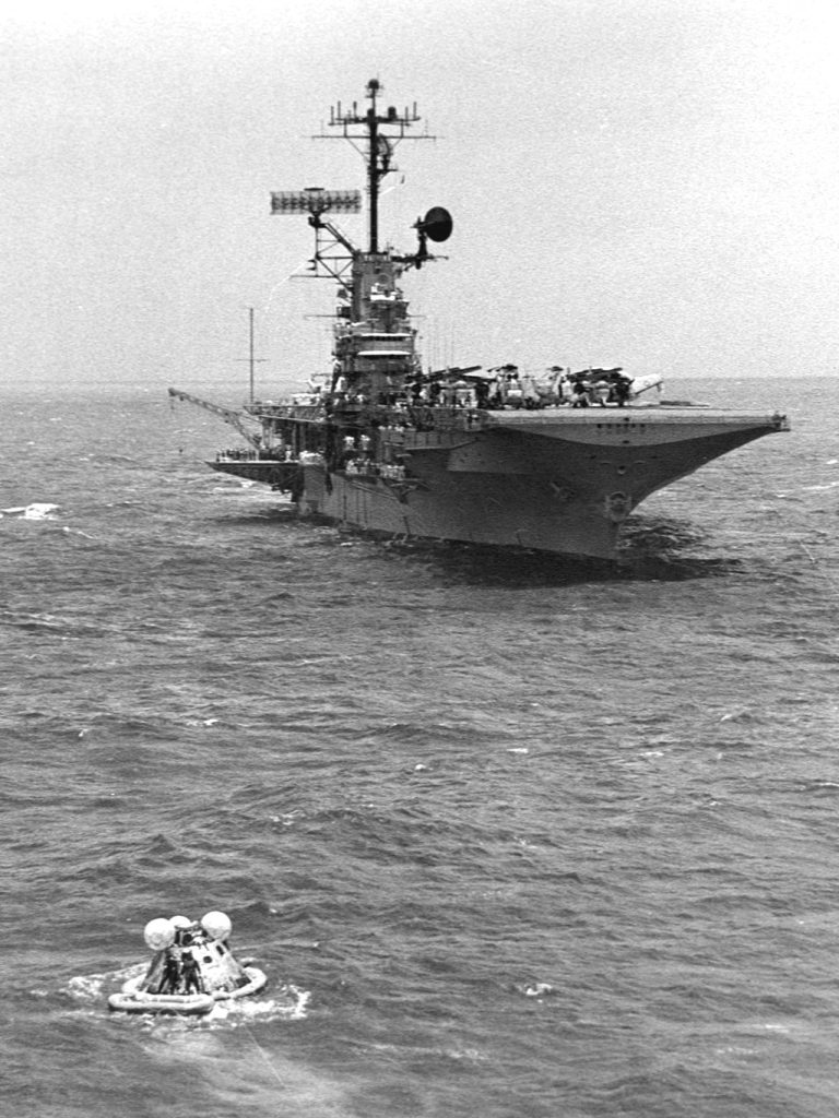 USS Hornet prepares to retrieve the Apollo 11 space capsule. 