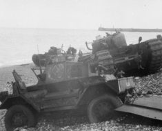 A British Dingo and two Churchill tanks on the beach after the Dieppe Raid.