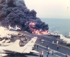 A-4 Skyhawks burn on the deck of USS Forrestal.