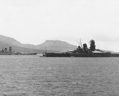 Musashi in the foreground, with her sister ship, the Yamato, in the background. Moored in Truk Lagoon in 1943.