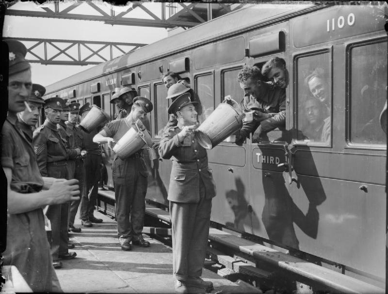 British soldiers arriving in London, greeted with tea and food. 